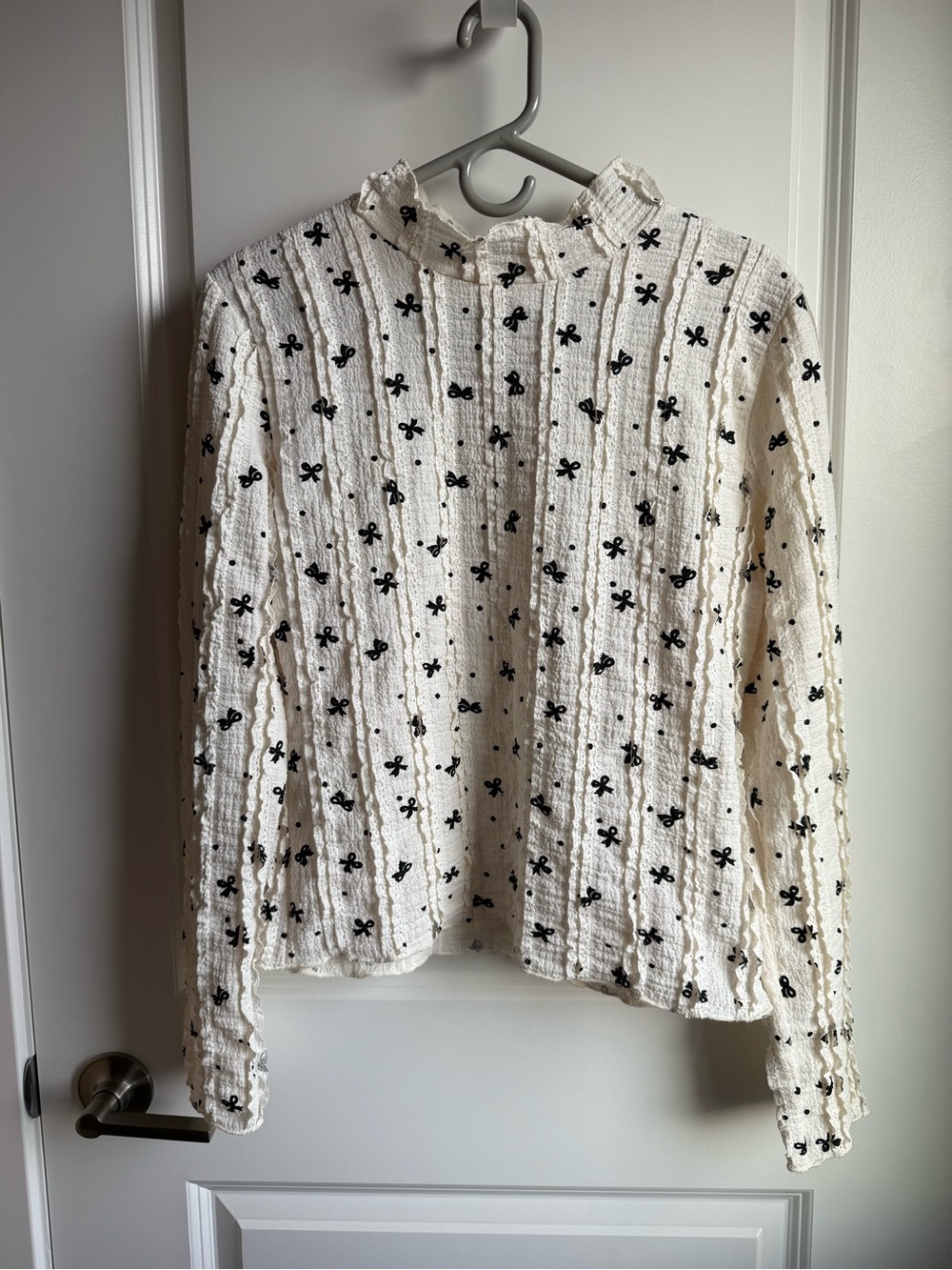 NWT Coquette ruffle bow cream and black blouse